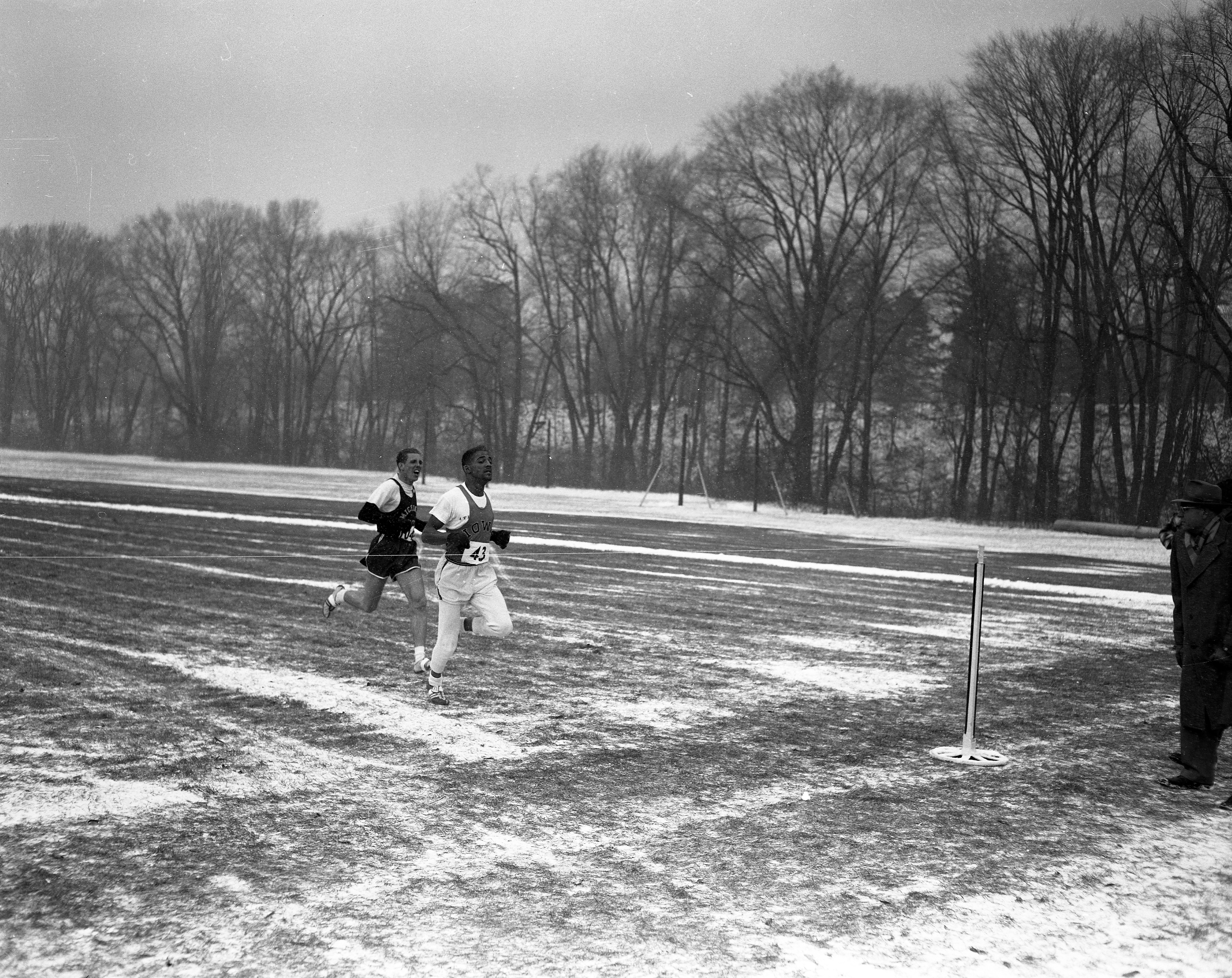 Deacon Jones holds off Henry Kennedy at the finish of the 1955 N.C.A.A. Cross-Country Championships in East Lansing. 